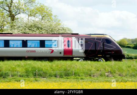 A CrossCountry class 220 Voyager diesel train, side view, near King`s Sutton, Northamptonshire, England, UK Stock Photo